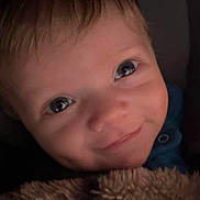 Cyrus joined the competition — help win amazing prizes! baby, smile, face, child, blanket, car_seat, graco, closeup, cute, infant, portrait, happy, soft, cozy, dim_light, person, young, eyes, hair, clothing