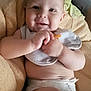 Raphaël participe au concours pour gagner de l'argent avec cette photo : baby, infant, smiling, diaper, bib, hands, face, skin, blanket, couch, happy, cute, child, portrait, indoor, relaxing, chubby, young, person, comfort