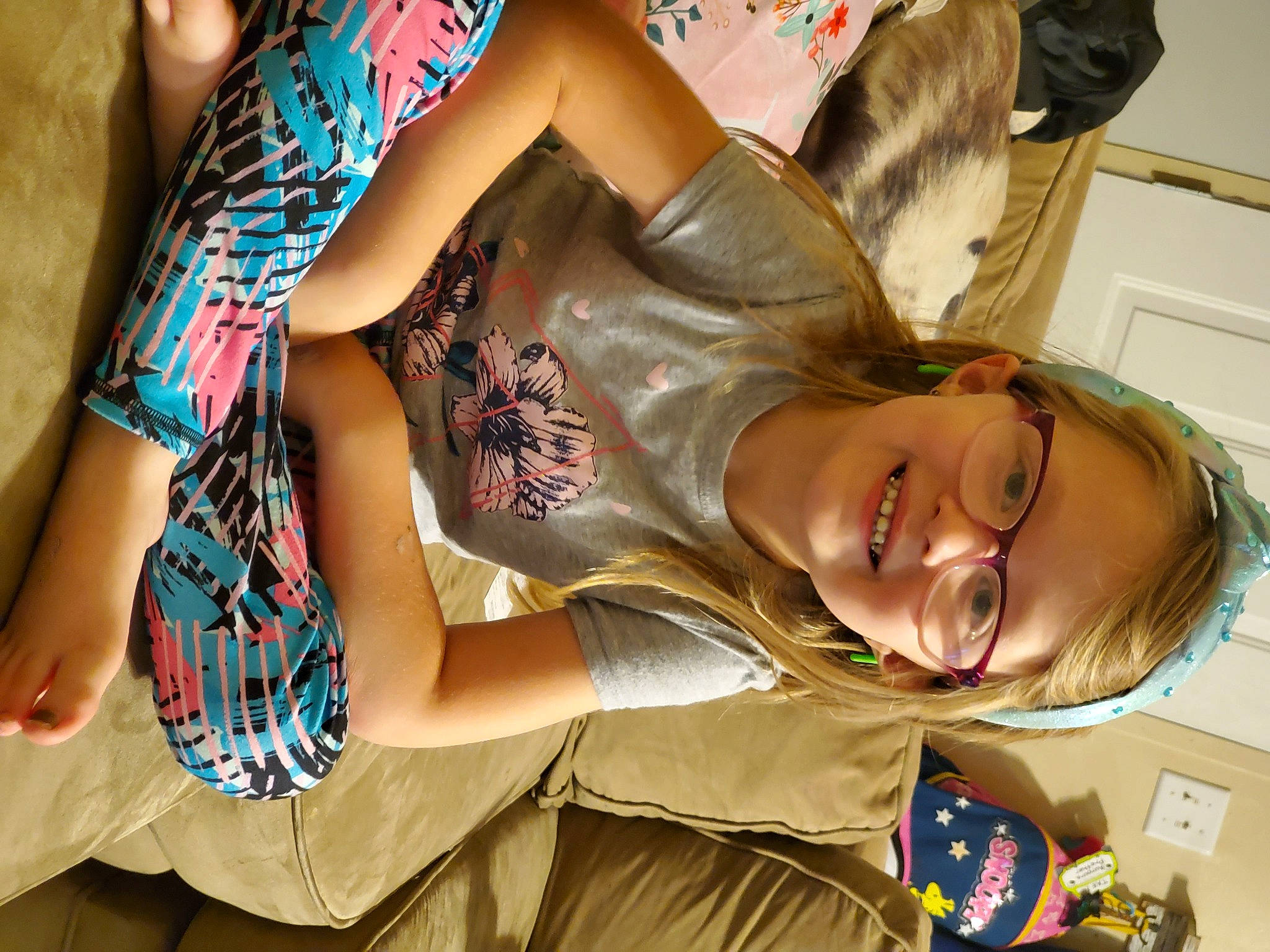 Auroura is registered to the contest to win money with this photo: abdomen, black_hair, brown_hair, dress, elbow, eyewear, fashion_design, fun, happy, human, human_leg, joy, leisure, long_hair, person, shoulder, skin, smile, thigh, trunk