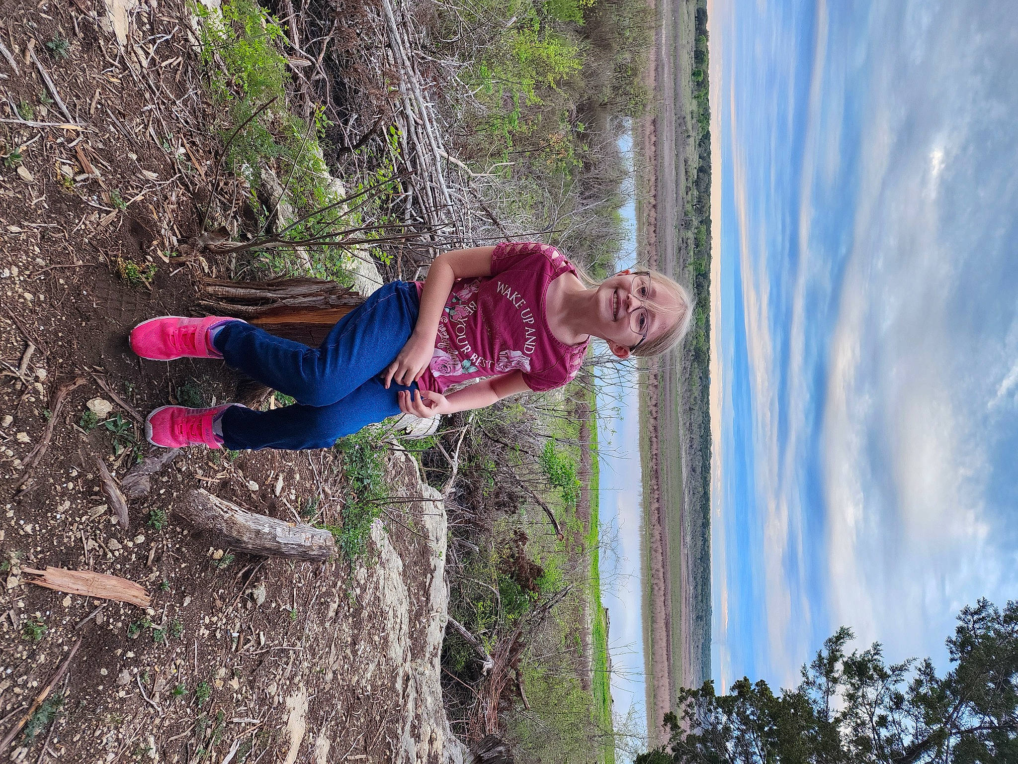 Auroura is registered to the contest to win money with this photo: adventure, child, cloud, fun, grass, happy, joy, leisure, magenta, people_in_nature, person, plant, recreation, sky, smile, soil, sport_climbing, toddler, tree, water