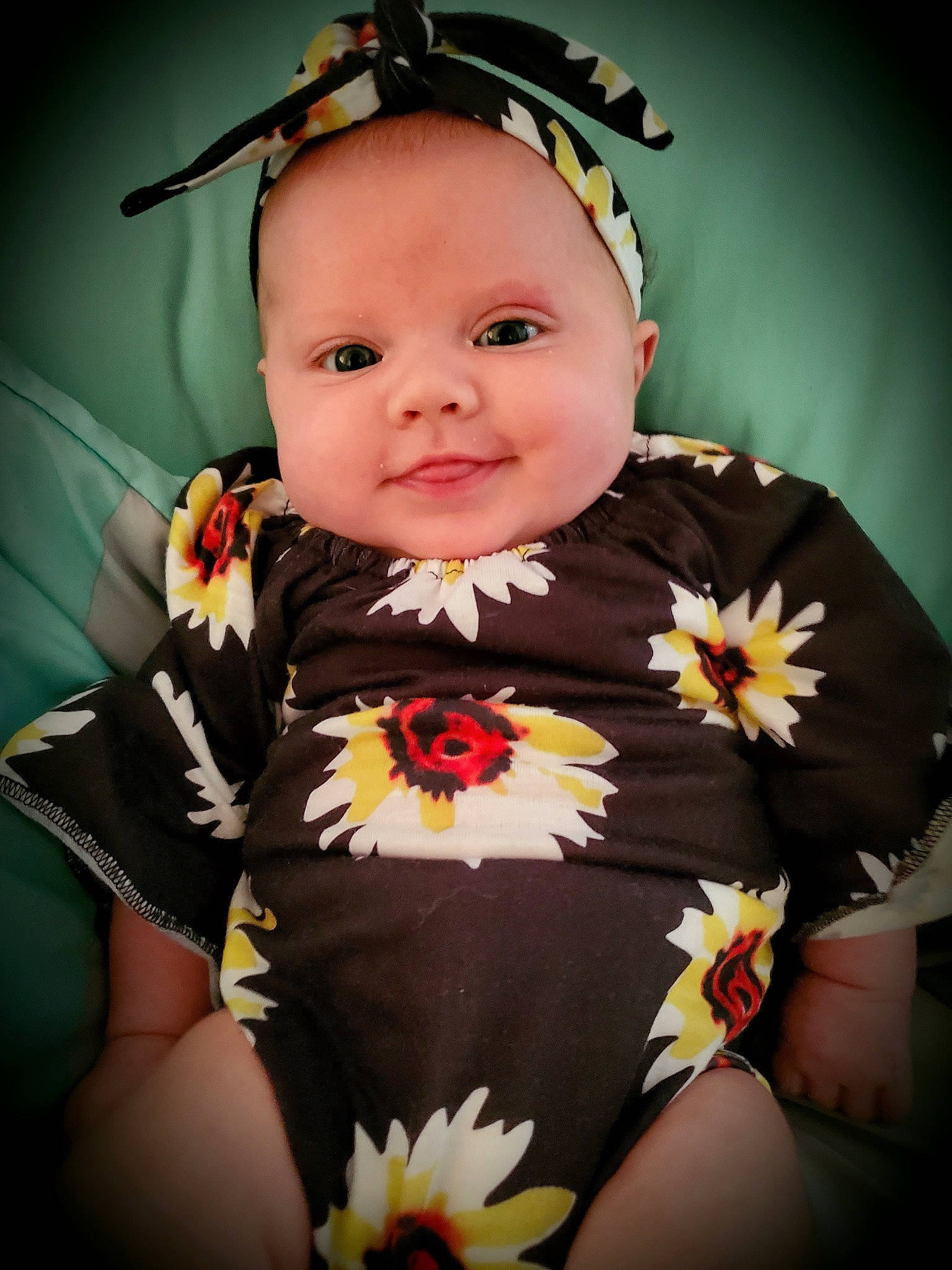 Lorraina joined the competition — help win amazing prizes! baby, baby_products, baby_toddler_clothing, cheek, child, eye, flash_photography, flower, happy, human_body, iris, neck, outerwear, pattern, person, petal, plant, sleeve, t_shirt, toddler