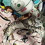 Muffy is registered to the contest to win money with this photo: cat, kitten, gray_tabby, blanket, plush_toy, stuffed_animal, pink, soft, sleepy, cute, cozy, bed, indoor, relaxed, animal, pet, fur, whiskers, ears, paw