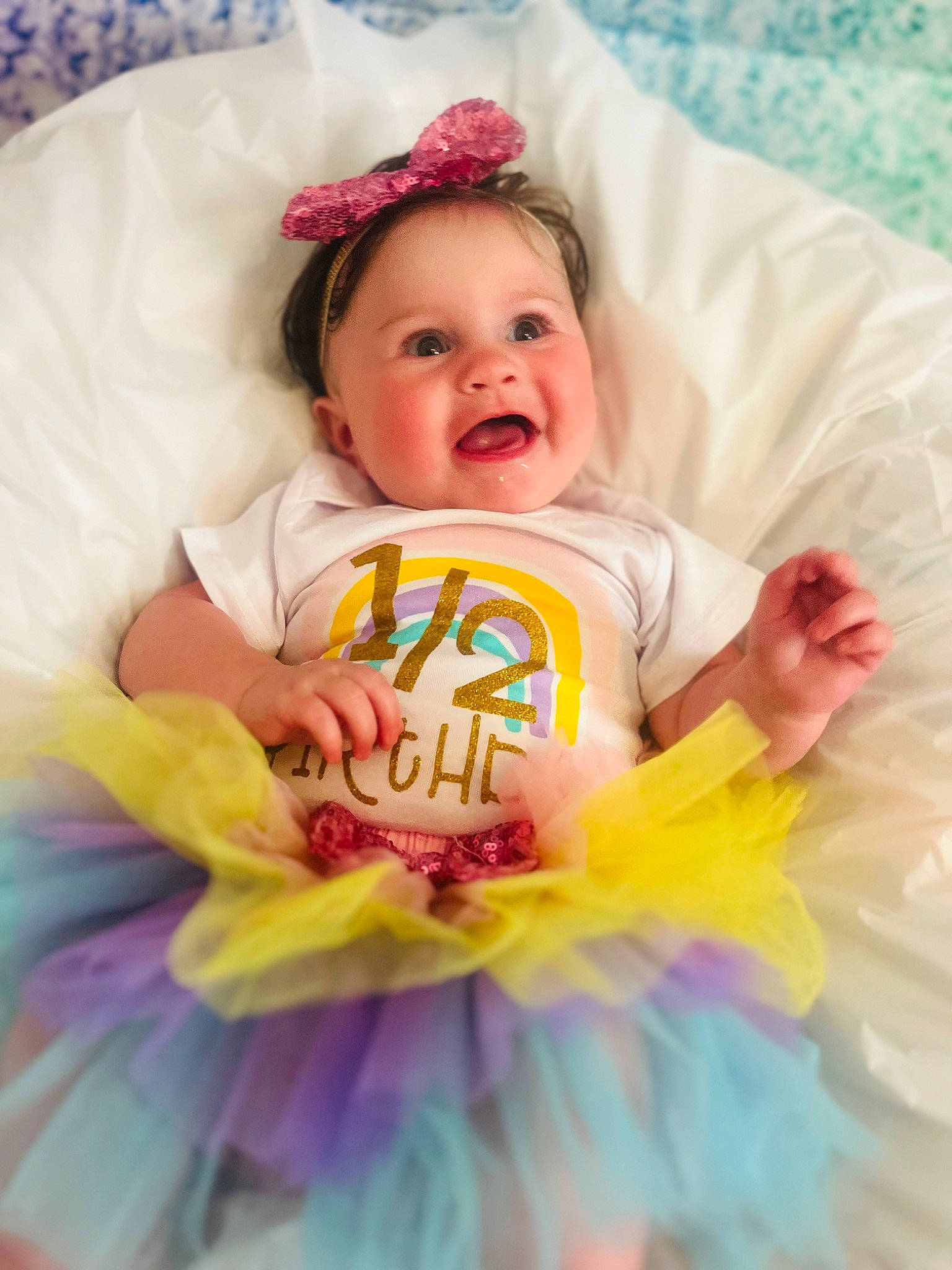 Lyanna joined the competition — help win amazing prizes! baby, baby_products, baby_toddler_clothing, child, costume_hat, event, face, fun, happy, headgear, headpiece, linens, magenta, person, pink, product, sleeve, smile, t_shirt, textile