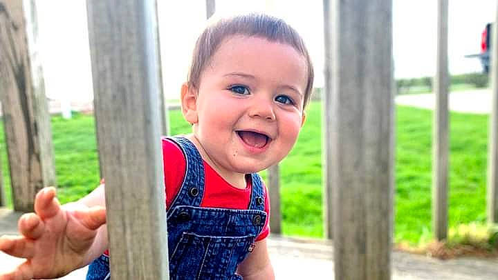 Baylor is registered to the contest to win money with this photo: baby, baby_laughing, baby_toddler_clothing, child, finger, gesture, happy, joy, laugh, nail, overall, person, skin, summer, thumb, toddler, tongue, tooth