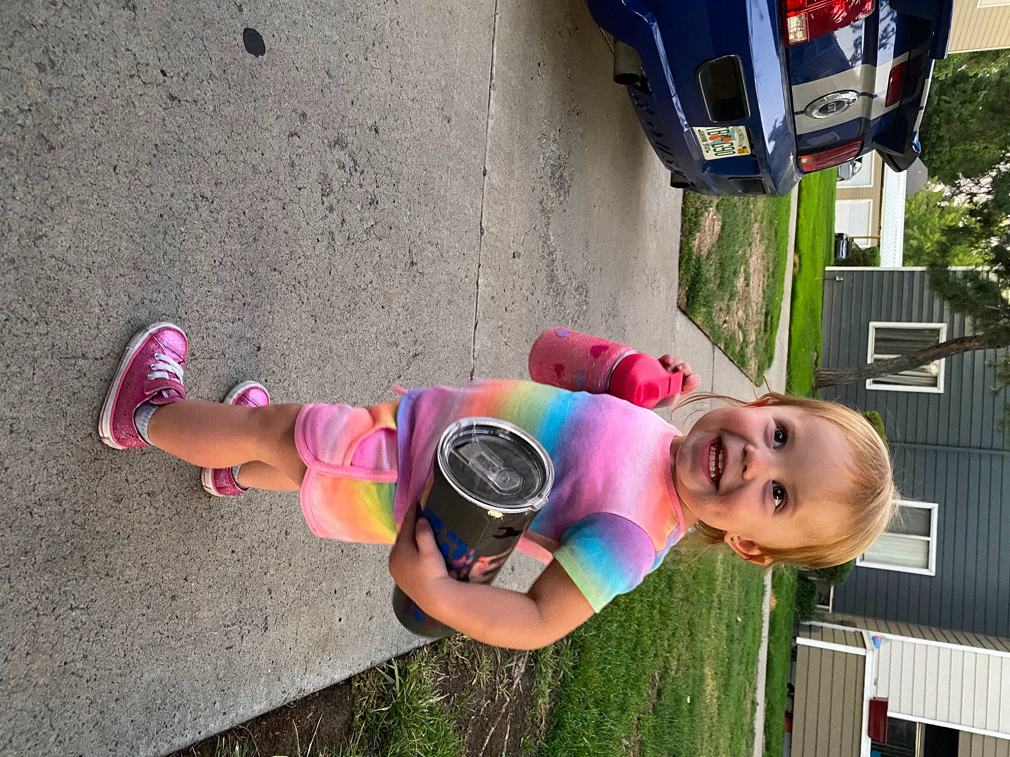 Isabelle is registered to the contest to win money with this photo: child, cool, fun, joy, person, pink, plant, play, selfie, vacation