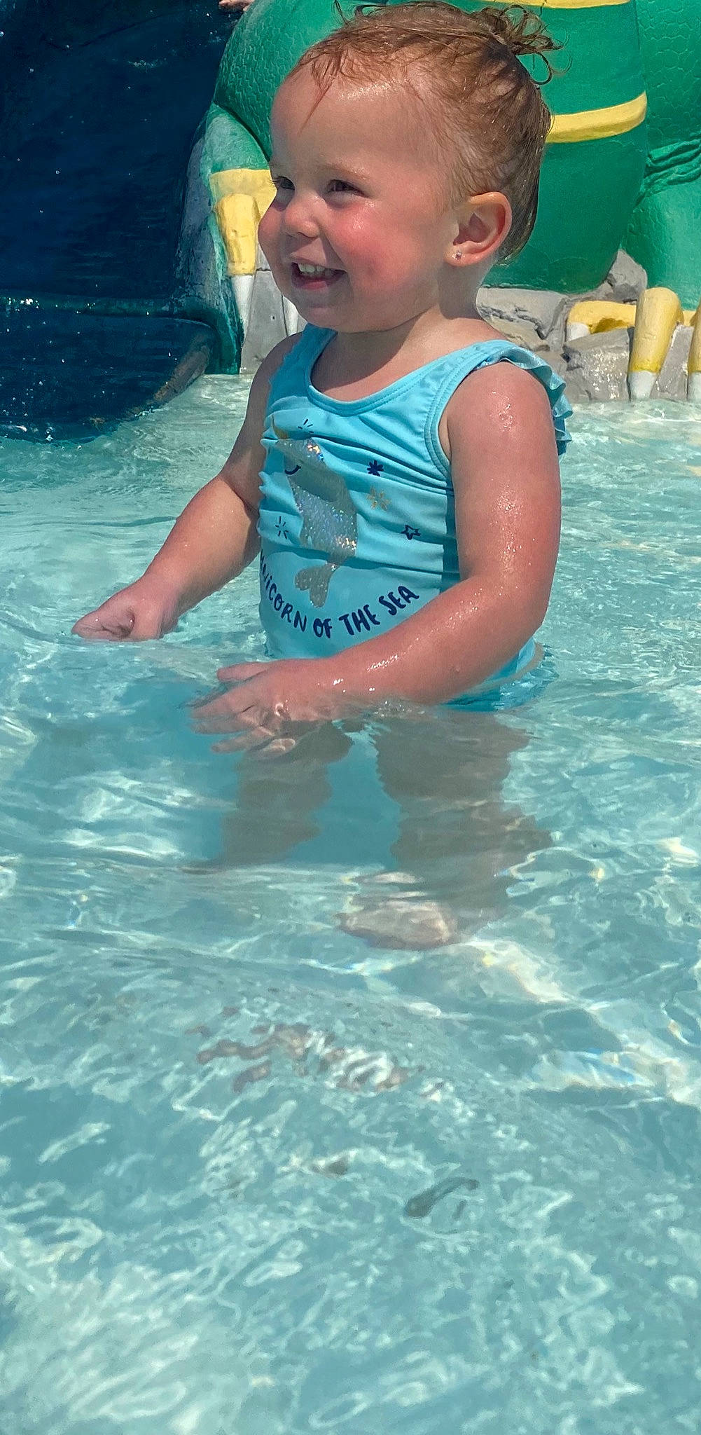 Isabelle joined the competition — help win amazing prizes! amusement_park, child, fun, joy, leisure, person, play, recreation, smile, summer, swimming_pool, toddler, vacation, water, water_park