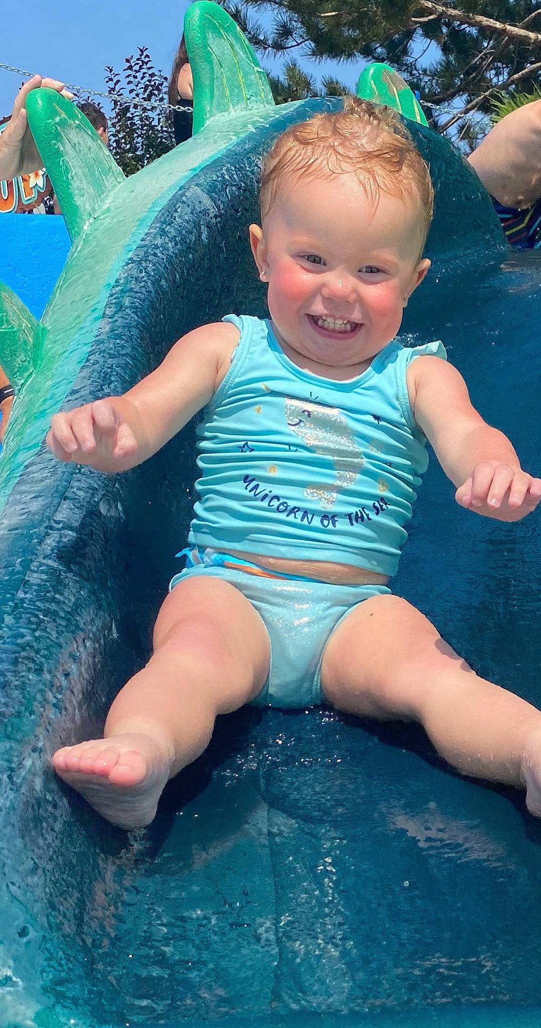Isabelle is registered to the contest to win money with this photo: baby, child, fun, joy, leg, leisure, person, play, recreation, smile, toddler, vacation, water, water_park
