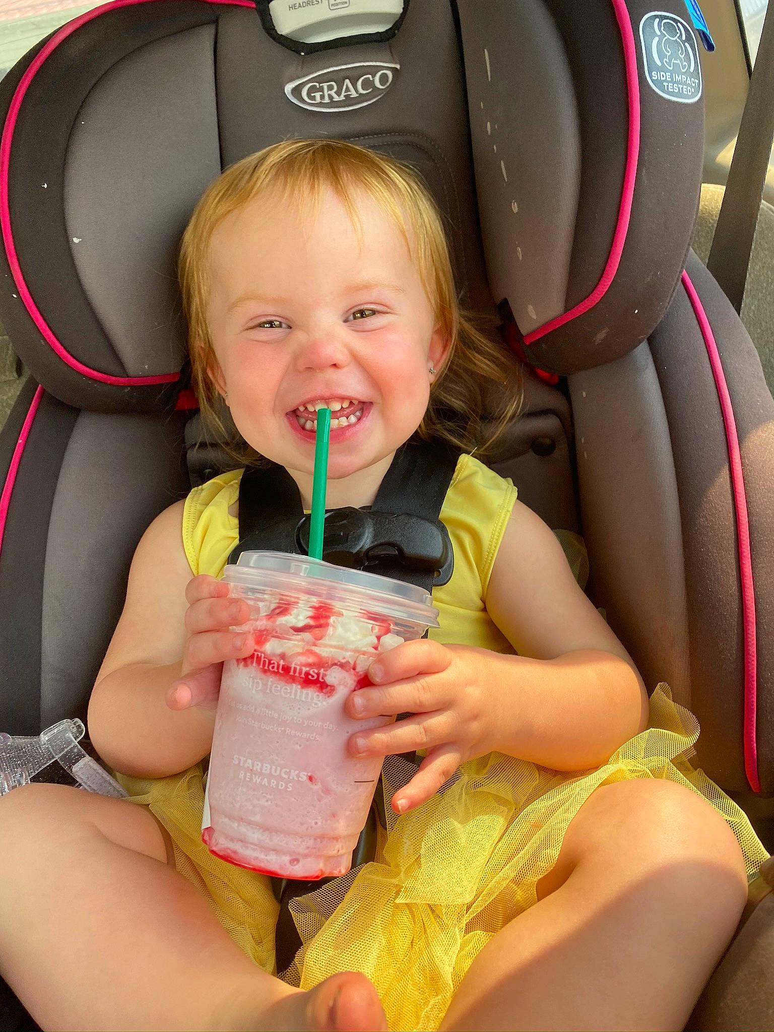 Isabelle is registered to the contest to win money with this photo: baby, baby_in_car_seat, baby_products, car_seat, child, person, product, seat_belt, sitting, toddler