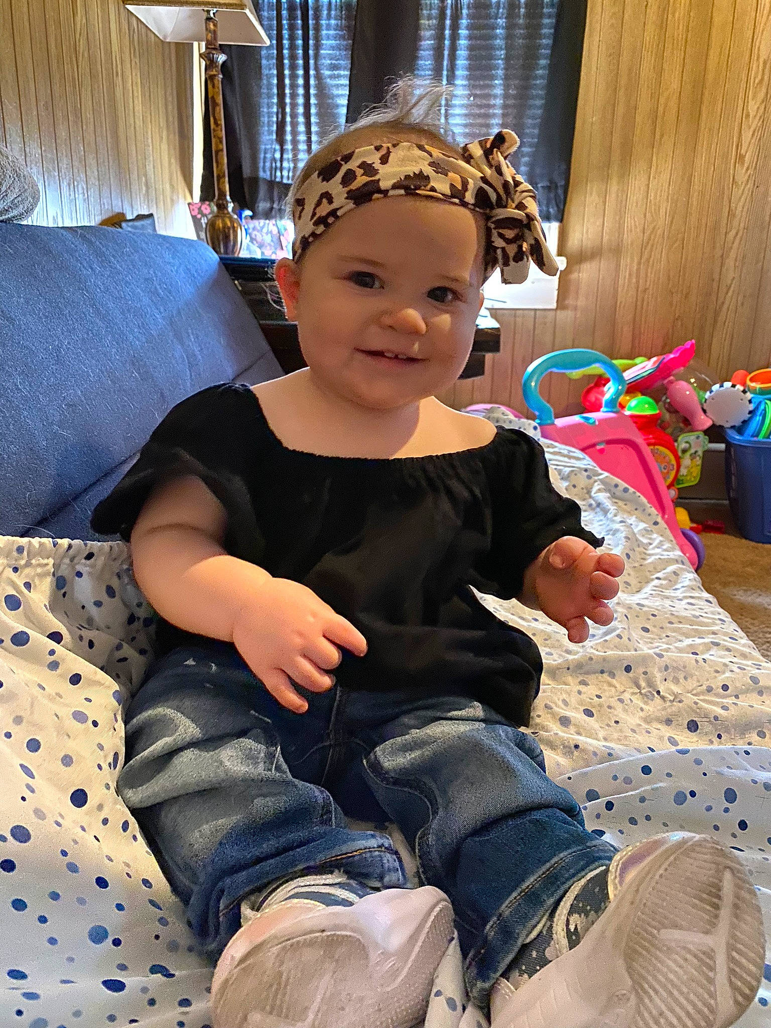 Clarissa is registered to the contest to win money with this photo: blue, child, curtain, denim, event, fashion_accessory, fashion_design, flooring, fun, happy, headgear, headpiece, headwear, jewellery, joy, leisure, pattern, person, room, sitting