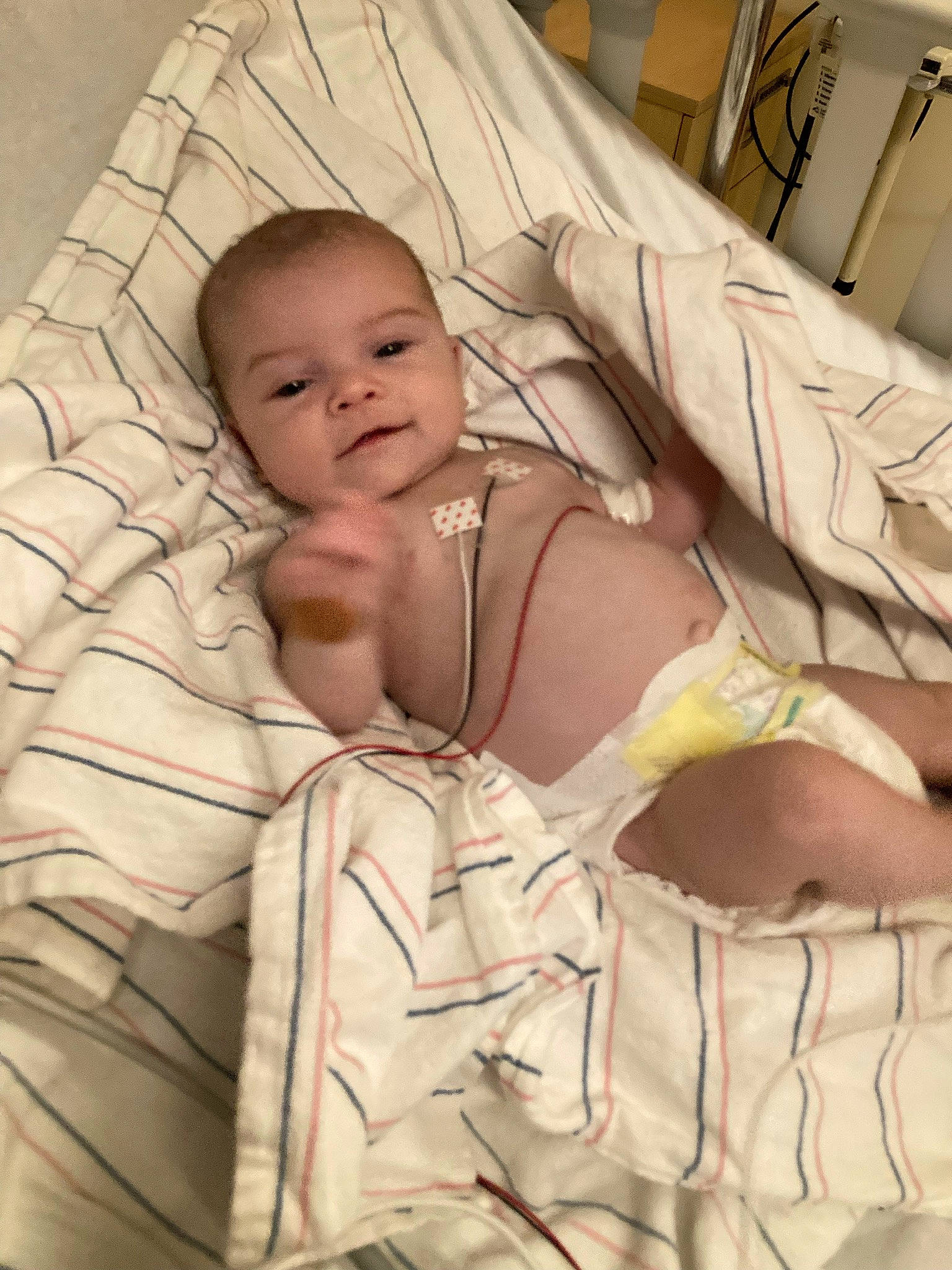 Clarissa is registered to the contest to win money with this photo: abdomen, baby, baby_products, baby_safety, bedding, bedtime, blanket, chest, child, comfort, event, eye, linens, pattern, person, room, sleep, smile, toddler