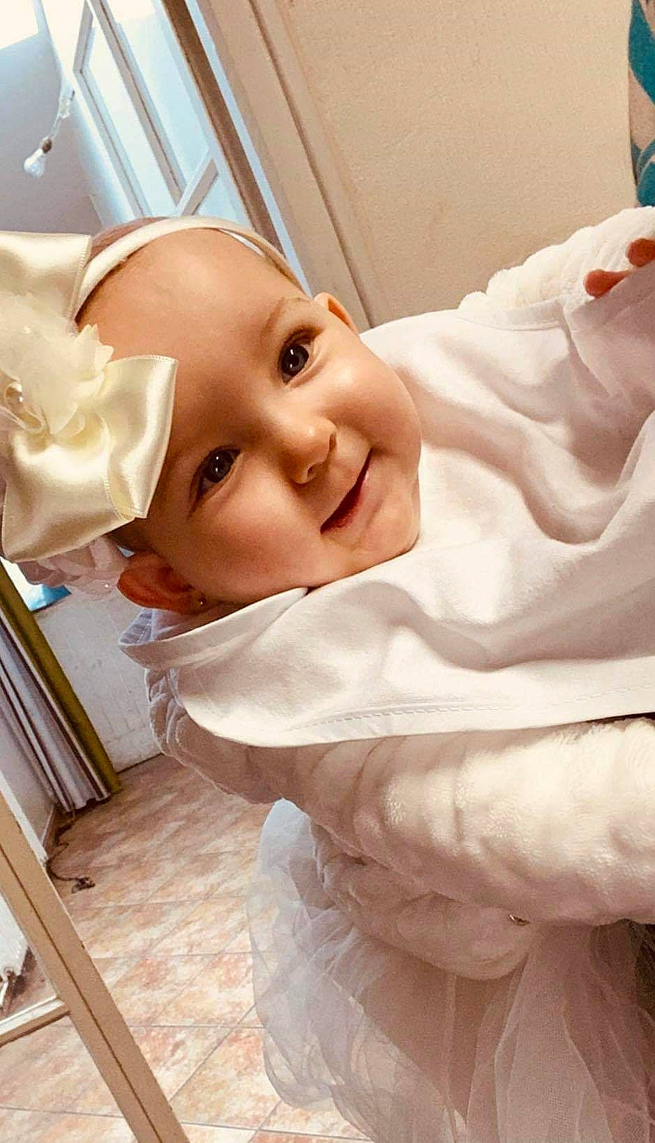 Tahlia participe au concours pour gagner de l'argent avec cette photo : baby, cheek, child, chin, head, mouth, nose, person, skin, smile, toddler