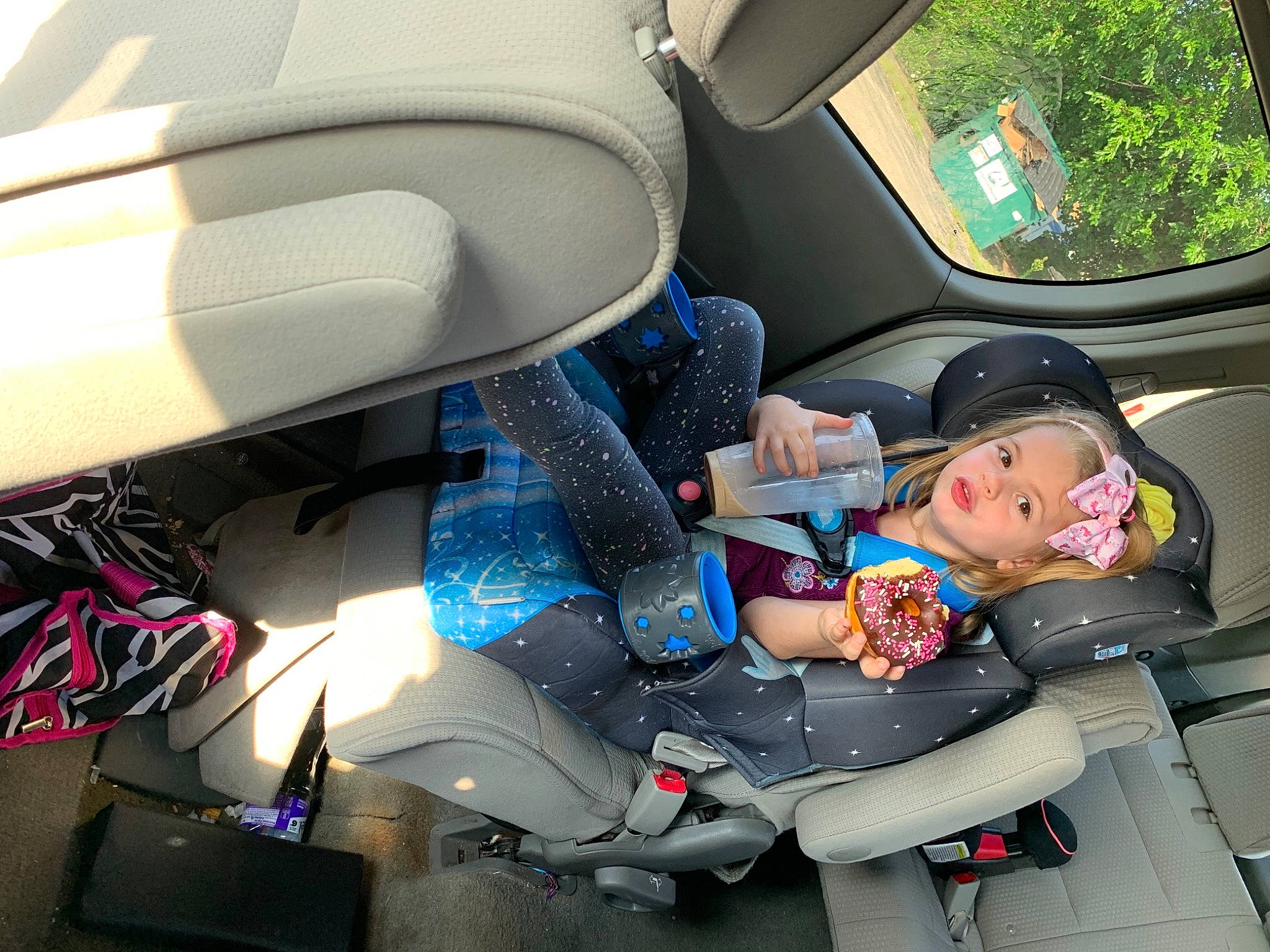 Jazzmyn is registered to the contest to win money with this photo: auto_part, automotive_design, automotive_exterior, car, car_seat, car_seat_cover, comfort, family_car, head_restraint, mode_of_transport, motor_vehicle, person, personal_luxury_car, plant, seat_belt, steering_part, steering_wheel, toddler, vehicle, vehicle_door