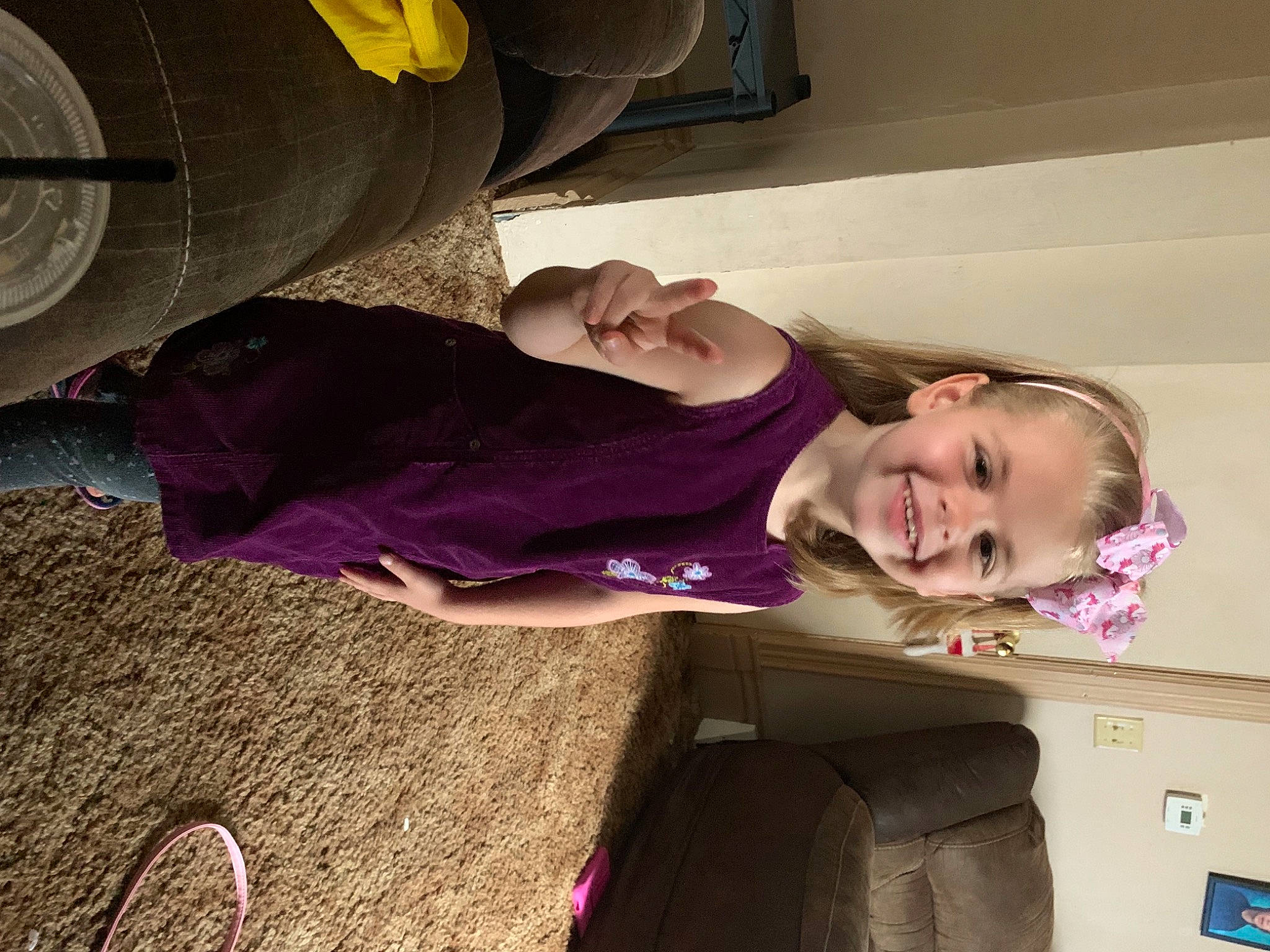 Jazzmyn is registered to the contest to win money with this photo: automotive_exterior, automotive_tire, child, comfort, dress, flooring, fun, happy, joy, laugh, luxury_vehicle, magenta, person, pink, sitting, smile, suit, sunglasses, t_shirt, toddler