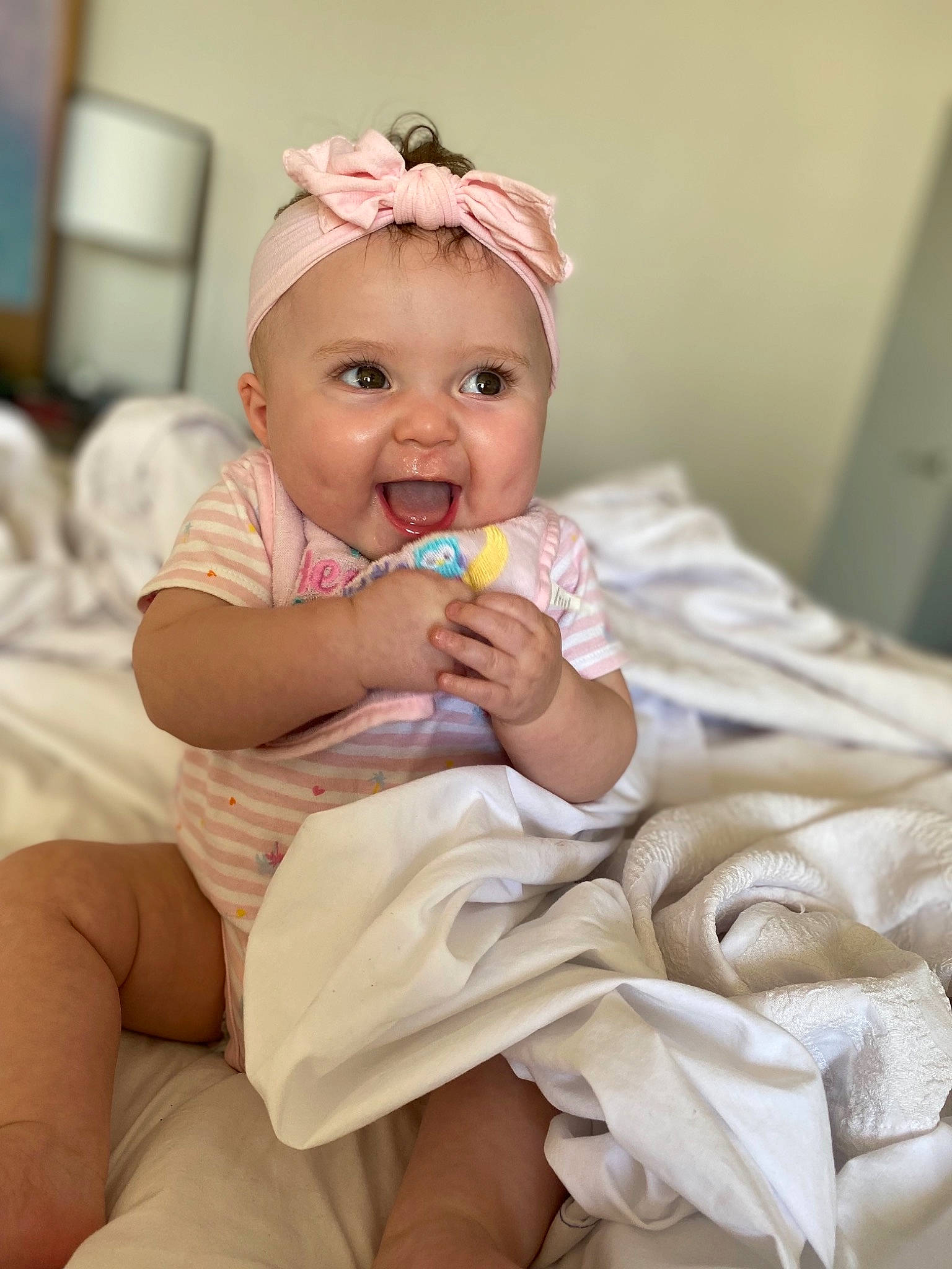 Veronica is registered to the contest to win money with this photo: baby, baby_toddler_clothing, cheek, child, chin, comfort, dress, eye, finger, flash_photography, happy, hat, head, headwear, iris, lip, mammal, person, pink, skin