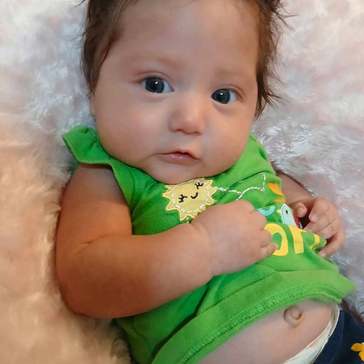 Liliana joined the competition — help win amazing prizes! accessories, baby, biting, bracelet, clothing, face, hair, head, hugging, jewelry, newborn, pants, person, photography, portrait, shorts, sitting, skin, sleeve, t_shirt