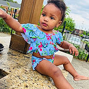 Michaela Hutchins joined the competition — help win amazing prizes! baby, backyard, clothing, face, grass, head, herbal, herbs, nature, outdoors, park, person, photography, plant, portrait, rock, shorts, sitting, summer, yard