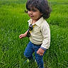 Phelopateer is registered to the contest to win money with this photo: casual_clothing, child, cute, daylight, grass, greenery, hair, happy, jeans, nature, outdoor, person, playful, portrait, small_child, smiling, sunglasses, toddler, walking, yellow_shirt