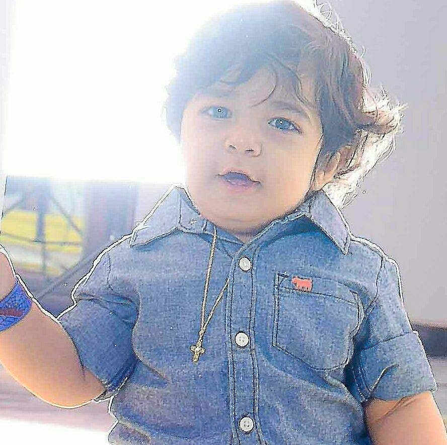 Phelopateer joined the competition — help win amazing prizes! toddler, child, denim_shirt, blue_eyes, curly_hair, necklace, cross, portrait, indoor, soft_light, cute, person, baby, fashion, casual_clothing, young_child, smiling, happy, face, front_view