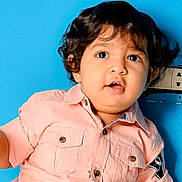 Phelopateer joined the competition — help win amazing prizes! baby, blue_background, button, button_up, child, clothing, curly, curly_hair, cute, expression, eyes, face, head, indoor, person, pink_shirt, portrait, skin, toddler, young_child