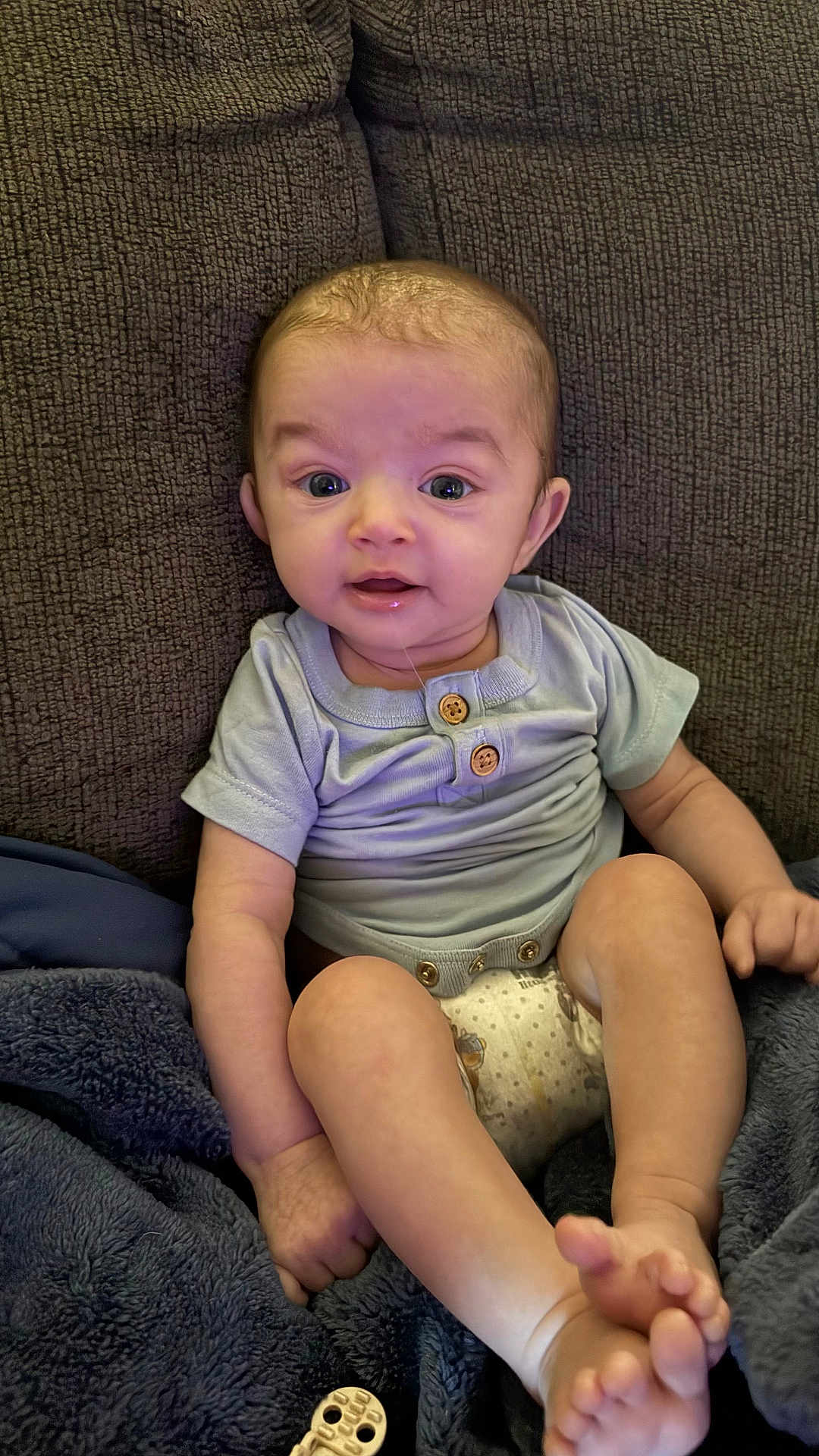 Kashten joined the competition — help win amazing prizes! baby, infant, couch, onesie, diaper, drool, blanket, sitting, cute, child, face, foot, hand, skin, expression, indoor, comfort, texture, clothing, portrait