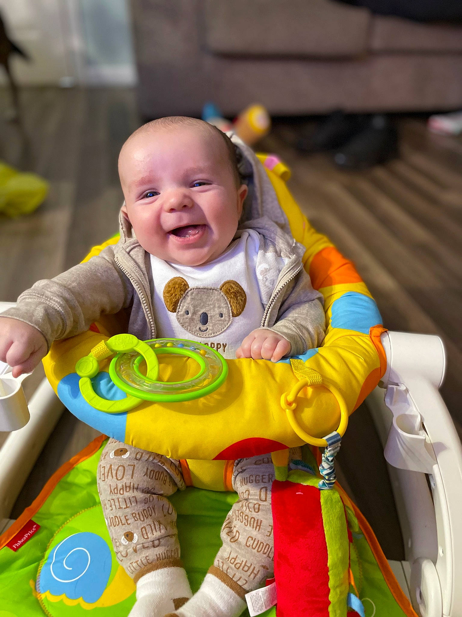 Brycen joined the competition — help win amazing prizes! baby, baby_playing_with_toys, baby_products, baby_toddler_clothing, baby_toys, child, event, eye, face, facial_expression, fun, grass, happy, leisure, orange, person, sitting, skin, smile, toddler