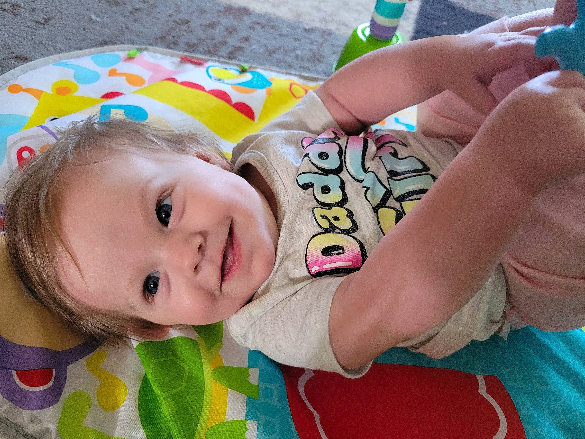 Rosalyn joined the competition — help win amazing prizes! baby, baby_playing_with_toys, baby_products, baby_toddler_clothing, baby_toys, cheek, child, fun, grass, happy, joy, leisure, nail, nose, pattern, person, play, smile, thumb, toddler