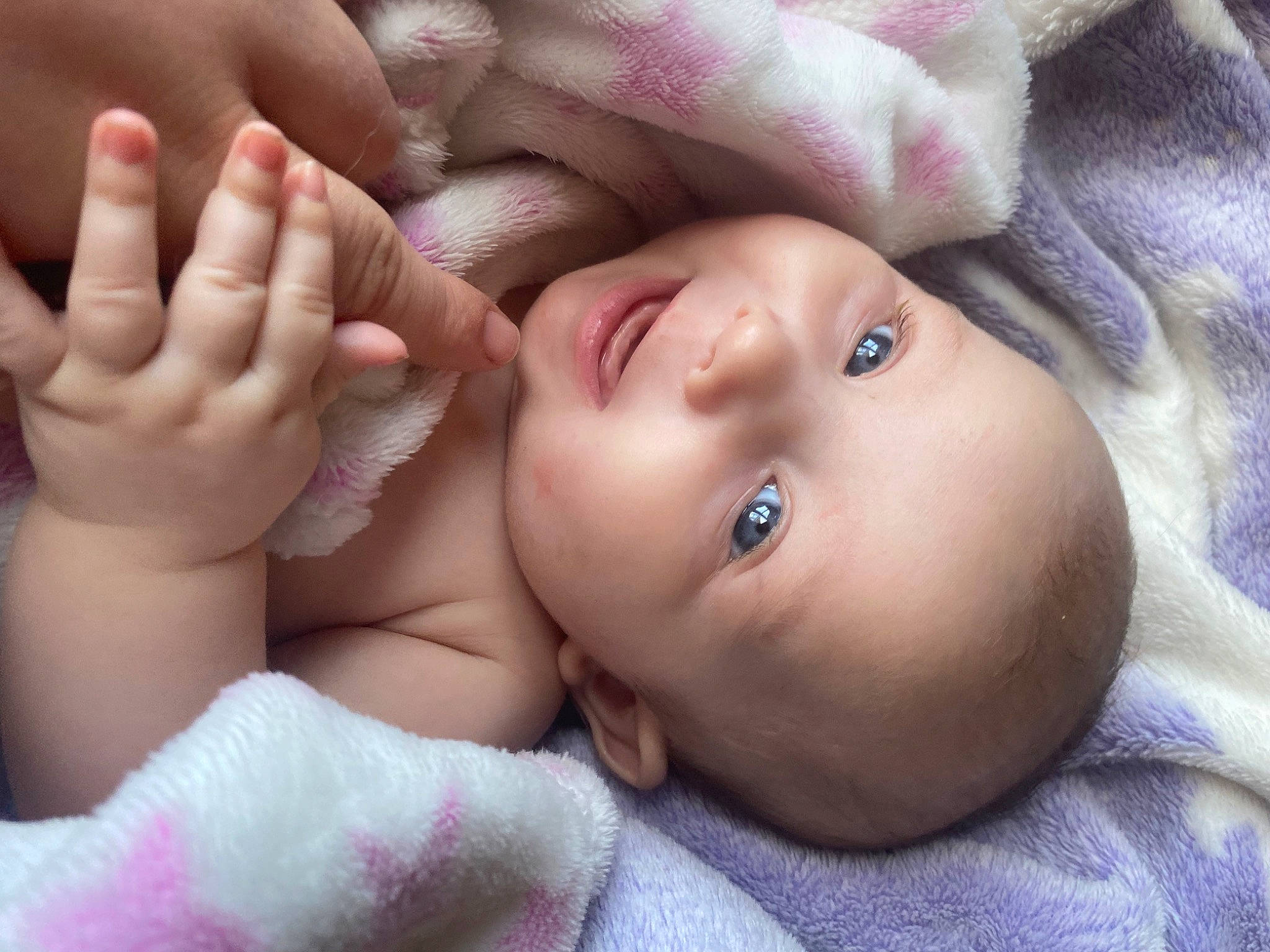 Scarlett is registered to the contest to win money with this photo: baby, cheek, child, chin, comfort, eye, eyebrow, eyelash, finger, gesture, human, human_body, iris, lip, mammal, mouth, nose, person, product, skin