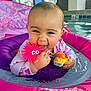 Aleia joined the competition — help win amazing prizes! baby, child, pool, water, floatation_device, toy, pink, swimwear, swimming_pool, playful, infant, smiling, cute, indoor, splash, colorful, person, fun, floating, swim_school