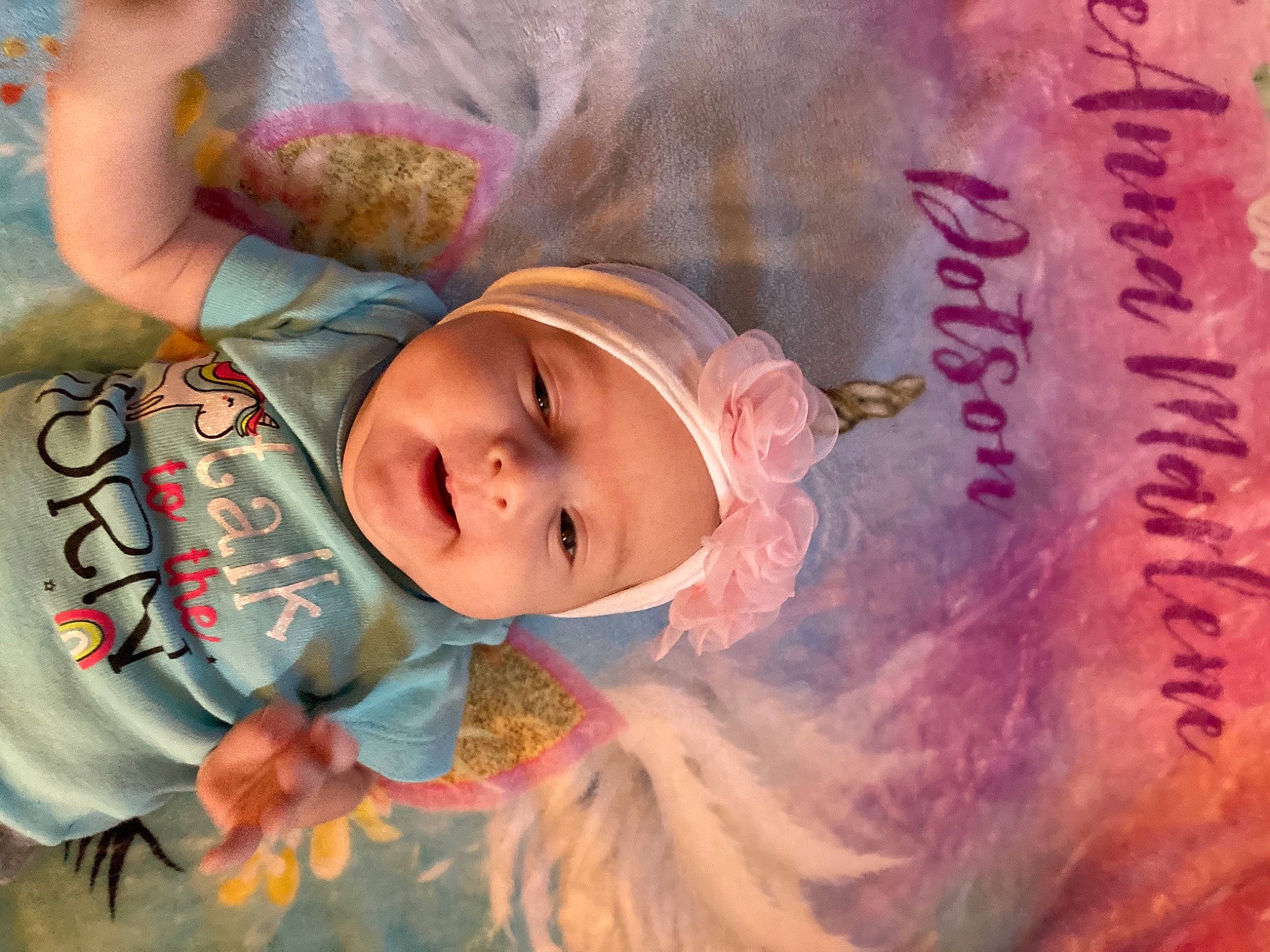 Arieanna joined the competition — help win amazing prizes! baby, baby_toddler_clothing, cheek, child, eye, face, facial_expression, grass, happy, head, headwear, lip, paint, pattern, person, pink, skin, sleeve, smile, textile