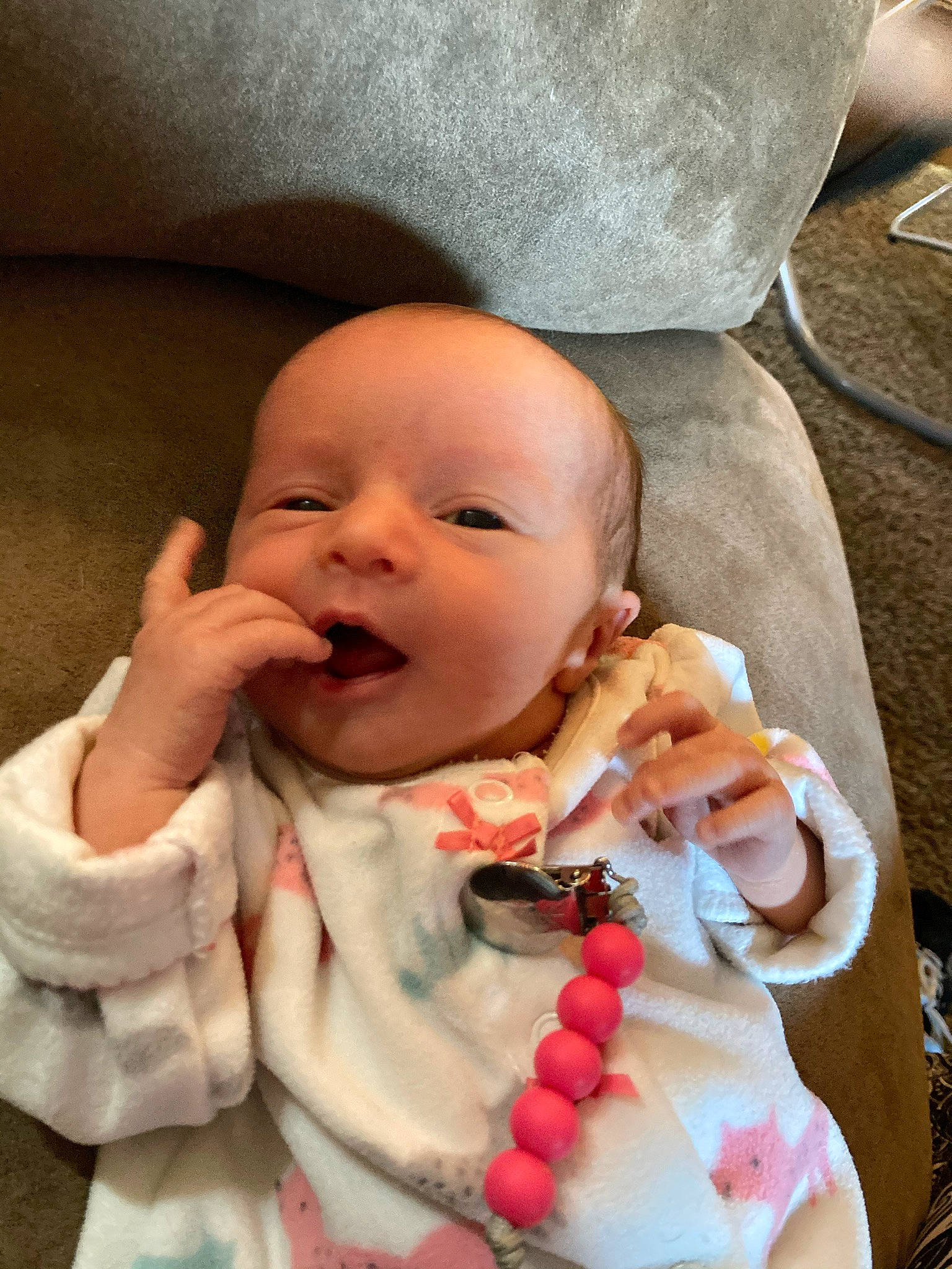 Arieanna is registered to the contest to win money with this photo: baby, baby_safety, baby_toddler_clothing, cheek, chin, comfort, face, finger, gesture, hand, head, human_body, lip, mouth, nose, person, pink, skin, textile, thumb
