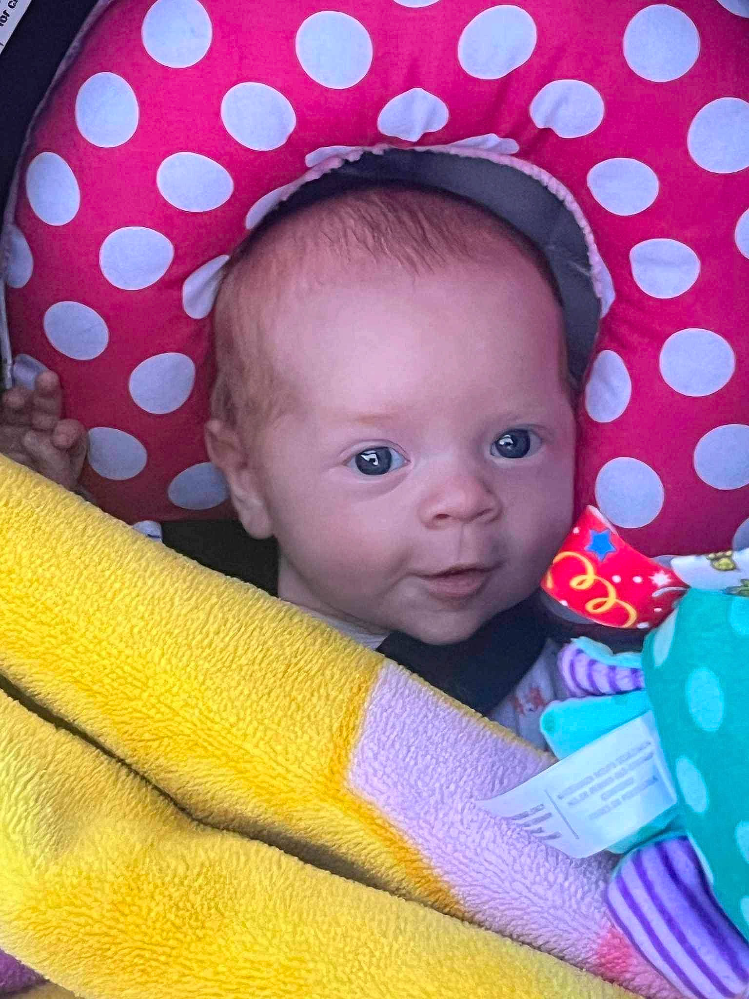 Serenity joined the competition — help win amazing prizes! baby, baby_products, baby_toddler_clothing, black, blue, cheek, child, comfort, eye, fashion_accessory, head, iris, lip, organ, pattern, person, pink, skin, sleeve, toddler