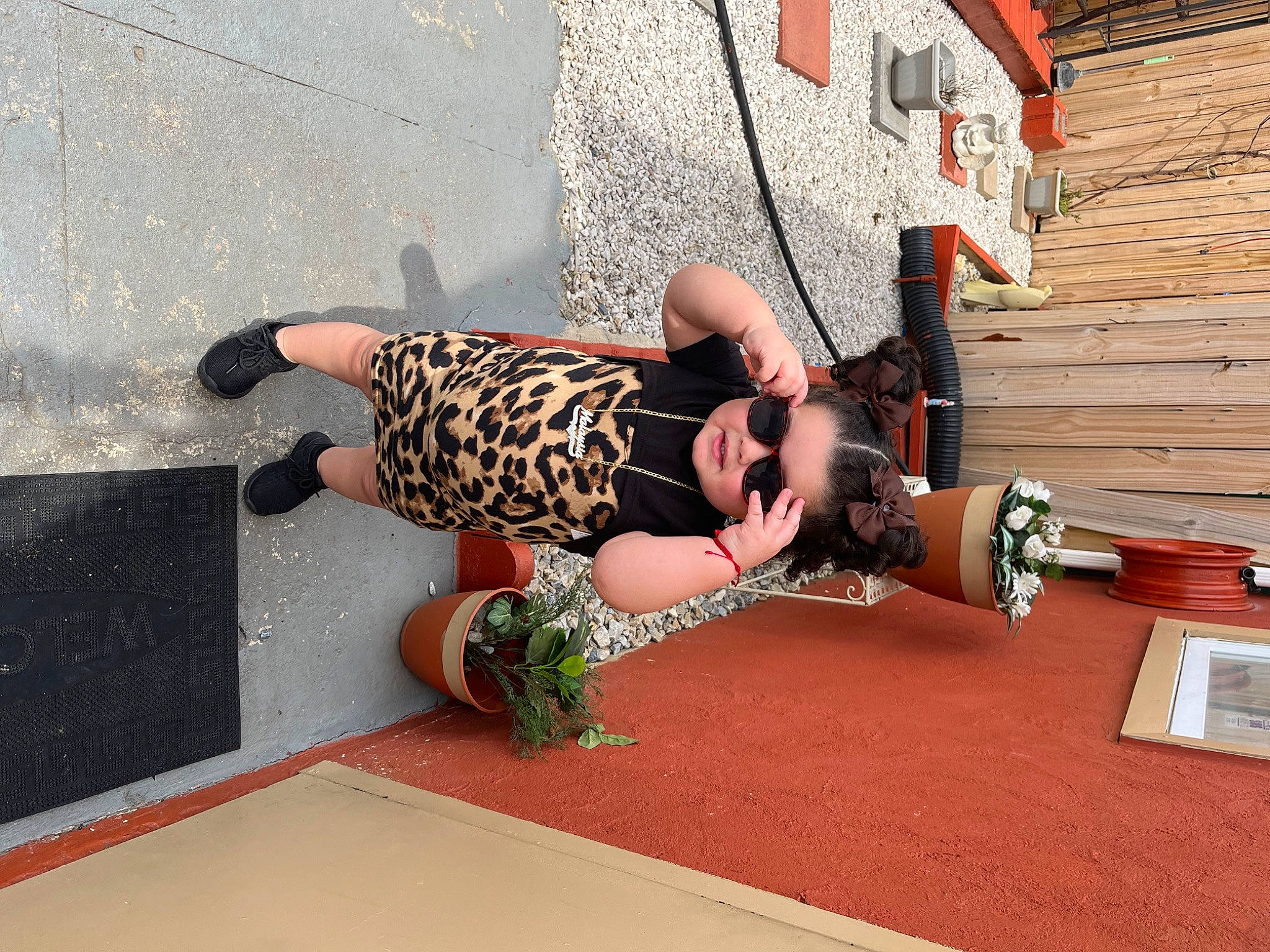 Malaysia is registered to the contest to win money with this photo: art, boot, calf, entertainment, event, eyewear, fashion_accessory, flooring, fun, hat, human_leg, joint, knee, leisure, performance_art, person, recreation, sandal, shorts, thigh