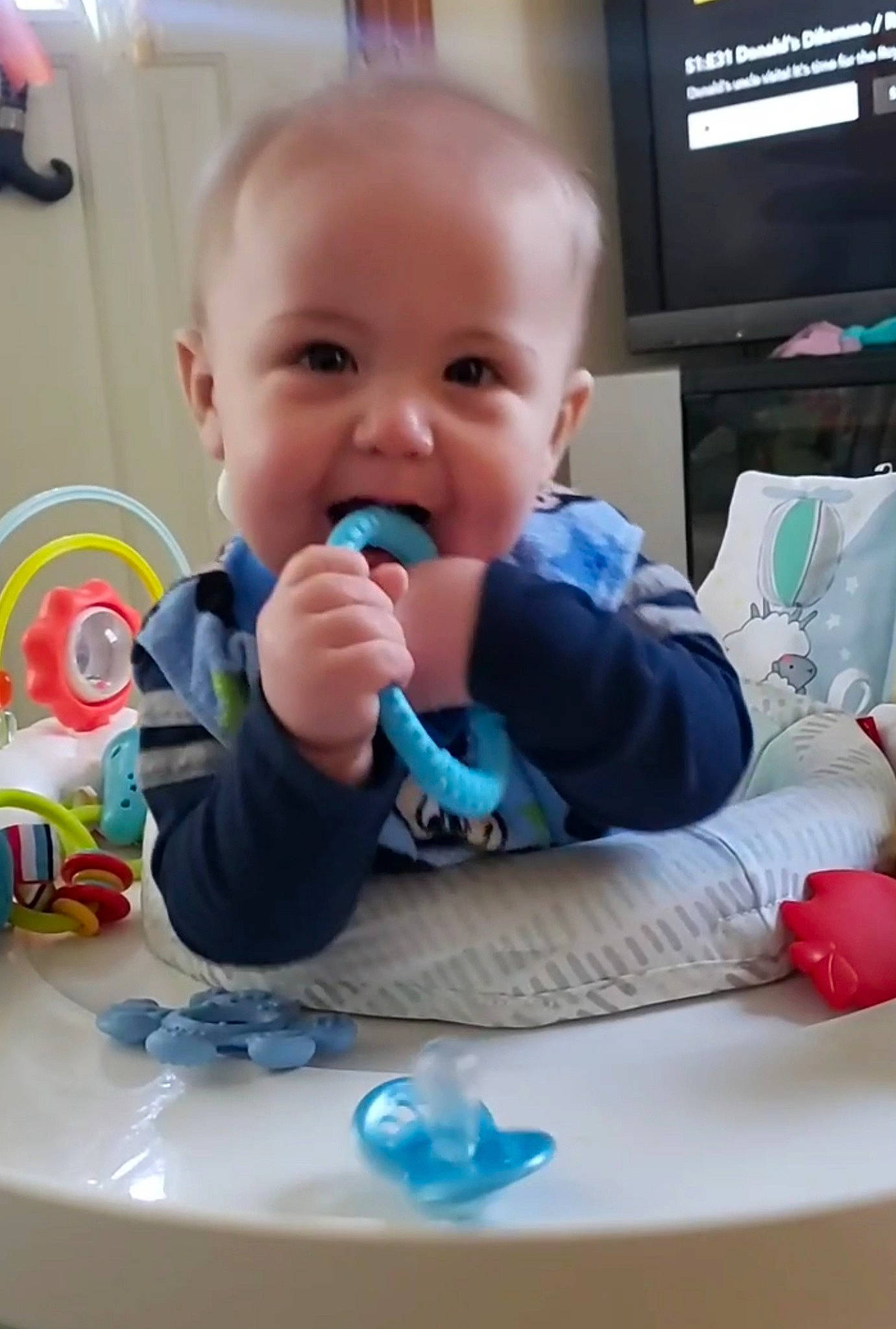 Johnathan joined the competition — help win amazing prizes! arm, baby, baby_playing_with_toys, baby_products, baby_toddler_clothing, chair, cheek, child, face, finger, fun, head, person, play, room, sitting, smile, table, television, thumb