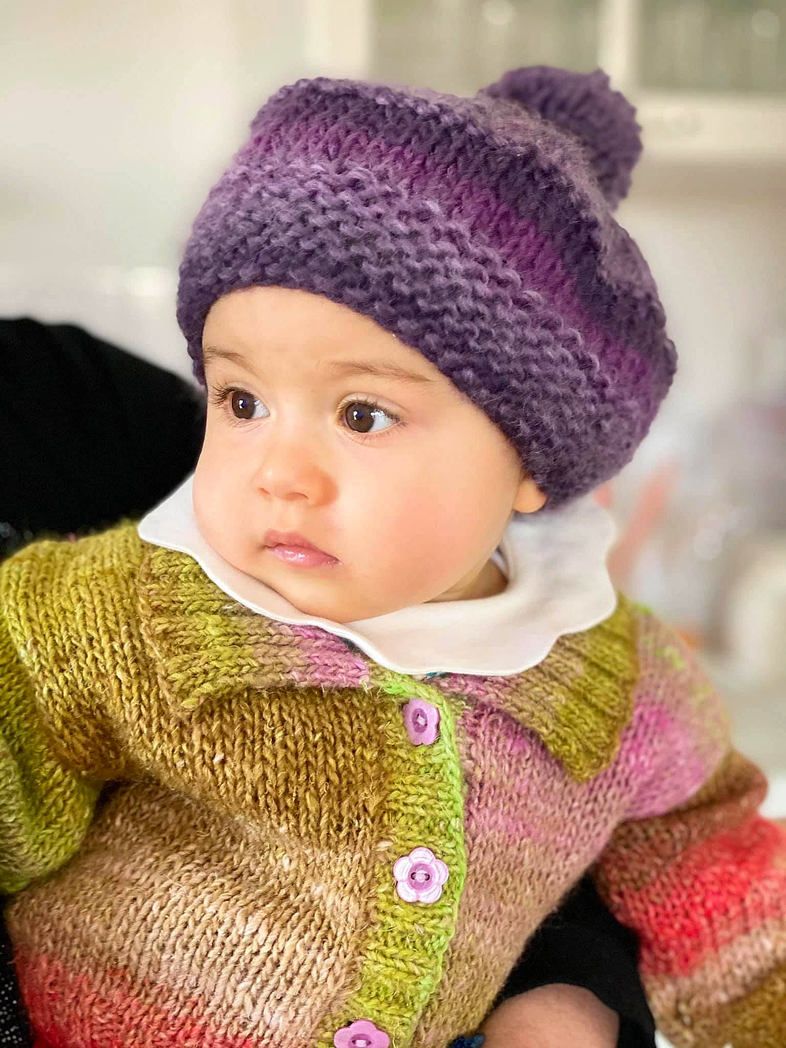 Vivienne a rejoint le concours — aidez-le/la à gagner de superbes lots ! baby, baby_toddler_clothing, cap, cheek, child, eye, face, happy, head, headwear, jacket, knit_cap, lip, magenta, organ, outerwear, person, pink, purple, sleeve