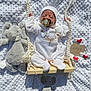 baby, infant, swing, white_clothing, knit_hat, pacifier, plush_toy, elephant_toy, blanket, embroidery, wooden_swing, heart_decorations, one_month, sleeping, cute, soft_texture, rope, newborn, portrait, indoor