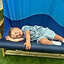 Kayson joined the competition — help win amazing prizes! boy, child, clothing, face, furniture, grass, head, hosiery, male, outdoors, person, photography, plant, playarea, portrait, shorts, sleeping, sock, summer, t_shirt