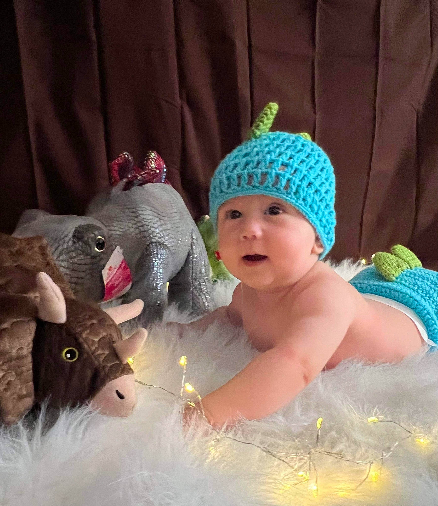 Rhiatt joined the competition — help win amazing prizes! baby, baby_toddler_clothing, cap, child, costume, costume_hat, doll, event, fashion_accessory, fun, fur, hair_accessory, headband, headgear, headpiece, headwear, jewellery, knit_cap, person, toddler