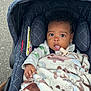 Jalen joined the competition — help win amazing prizes! baby, infant, blanket, car_seat, child, cute, expression, face, tongue, quilted, blue, outdoor, person, young, child_seat, warm, clothing, pacifier, hand, sitting