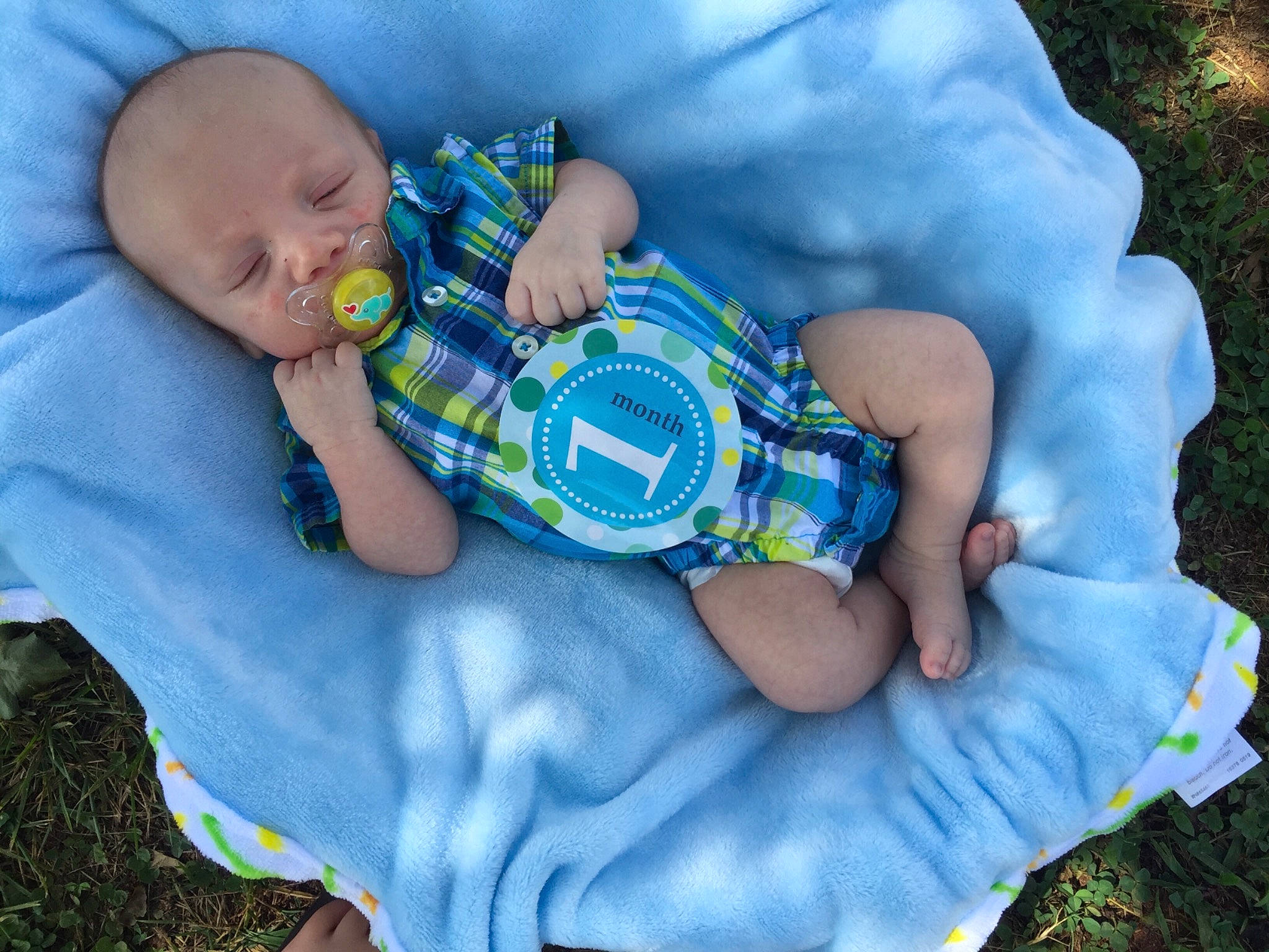 Maddix joined the competition — help win amazing prizes! baby, baby_products, baby_sleeping, baby_toddler_clothing, child, diaper, grass, nap, person, play, product, sitting, sleep, toddler