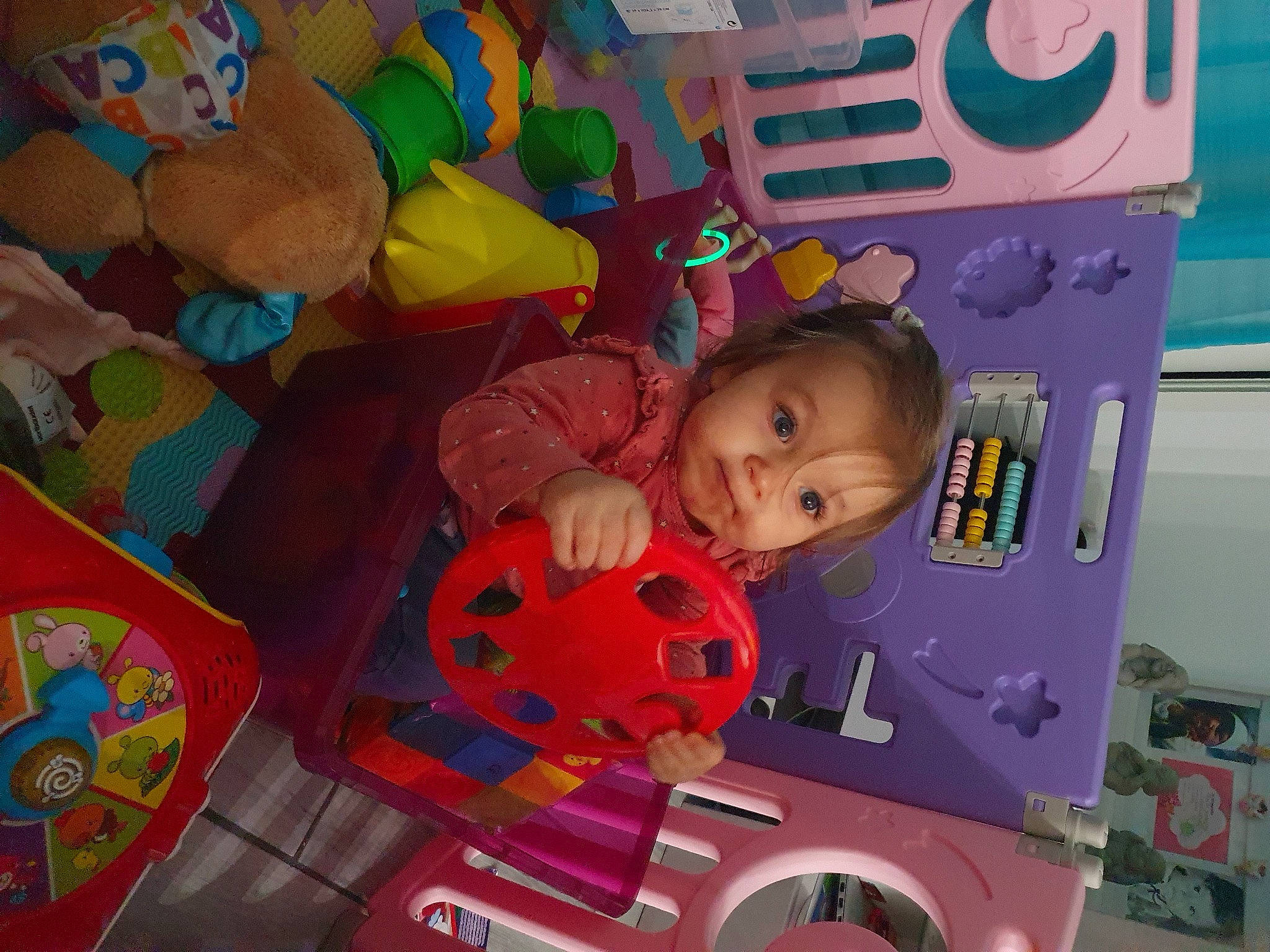 Camille a rejoint le concours — aidez-le/la à gagner de superbes lots ! art, baby, baby_products, baby_toys, ball, child, flooring, football, fun, leisure, magenta, person, play, product, recreation, room, smile, snapshot, stuffed_toy, toddler