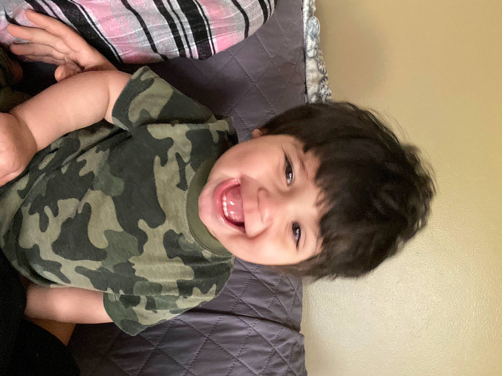 Isaiah joined the competition — help win amazing prizes! arm, camouflage, cheek, child, comfort, finger, gesture, hand, happy, headgear, human_body, joy, military_camouflage, nose, pattern, person, product, skin, smile, thumb