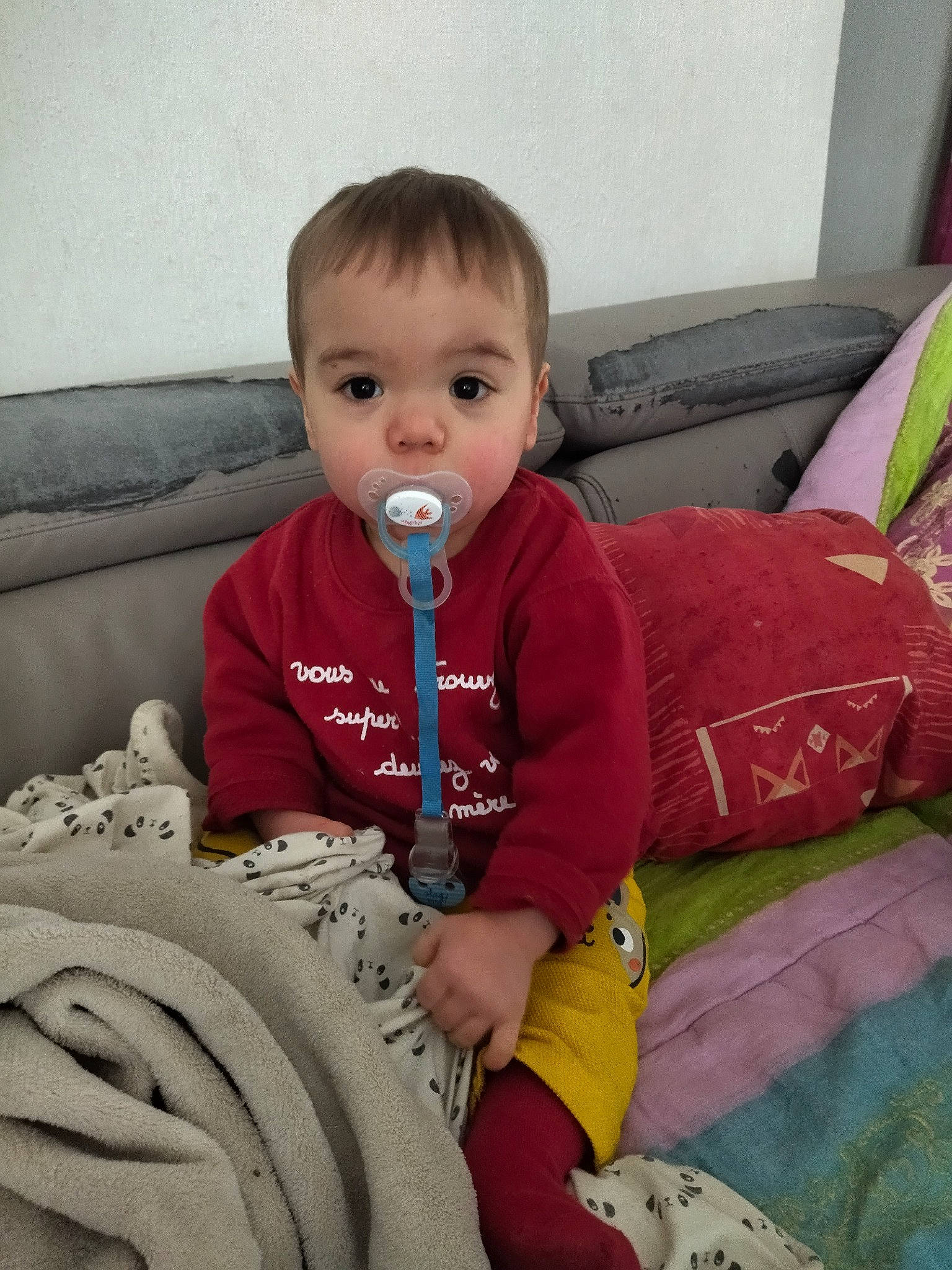 Evan a rejoint le concours — aidez-le/la à gagner de superbes lots ! automotive_tire, baby, baby_products, baby_toddler_clothing, cheek, child, comfort, face, facial_expression, fun, happy, head, linens, mammal, nose, organ, person, product, sitting, skin