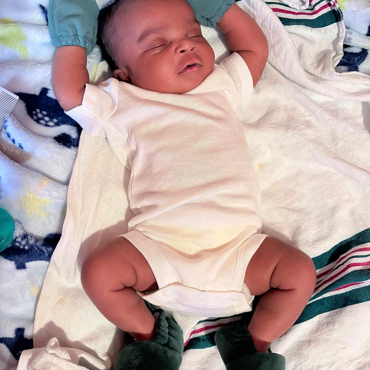 Kelin is registered to the contest to win money with this photo: adorable, baby, blanket, booties, closed_eyes, cute, infant, lying_down, mittens, newborn, nursery_item, onesie, peaceful, portrait, sleeping, soft_fabric, striped_blanket, tiny_arms, tiny_legs, towel