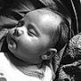 Zoé a rejoint le concours — aidez-le/la à gagner de superbes lots ! baby, sleeping, infant, black_and_white, portrait, face, clothing, fabric, pattern, soft, peaceful, closeup, newborn, cute, head, resting, skin, child, indoors, gentle