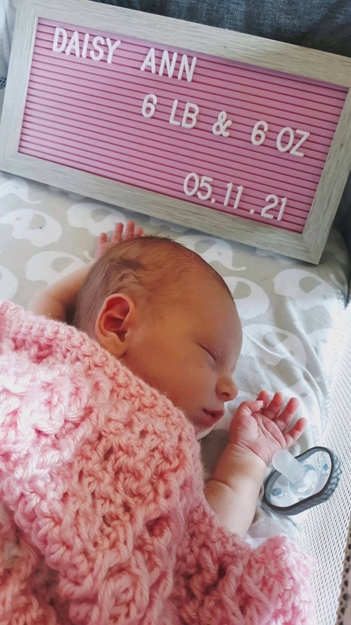 Daisy is registered to the contest to win money with this photo: baby, baby_sleeping, baby_toddler_clothing, beauty, bedding, bedtime, cheek, child, comfort, finger, font, happy, linens, people, person, pink, product, room, skin, textile