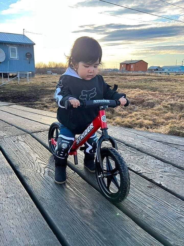 Indy is registered to the contest to win money with this photo: automotive_tire, automotive_wheel_system, bicycle, bicycle_accessory, bicycle_frame, bicycle_handlebar, bicycle_part, bicycle_tire, bicycle_wheel, bicycles_equipment_and_supplies, cloud, cycling, person, recreation, rim, rolling, sky, spoke, tire, toddler