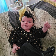 Lana joined the competition — help win amazing prizes! baby, babylaughing, blanket, bodypart, clothing, couch, cushion, face, furniture, hair, happy, head, homedecor, person, photography, portrait, quilt, sitting, sleeve, smile