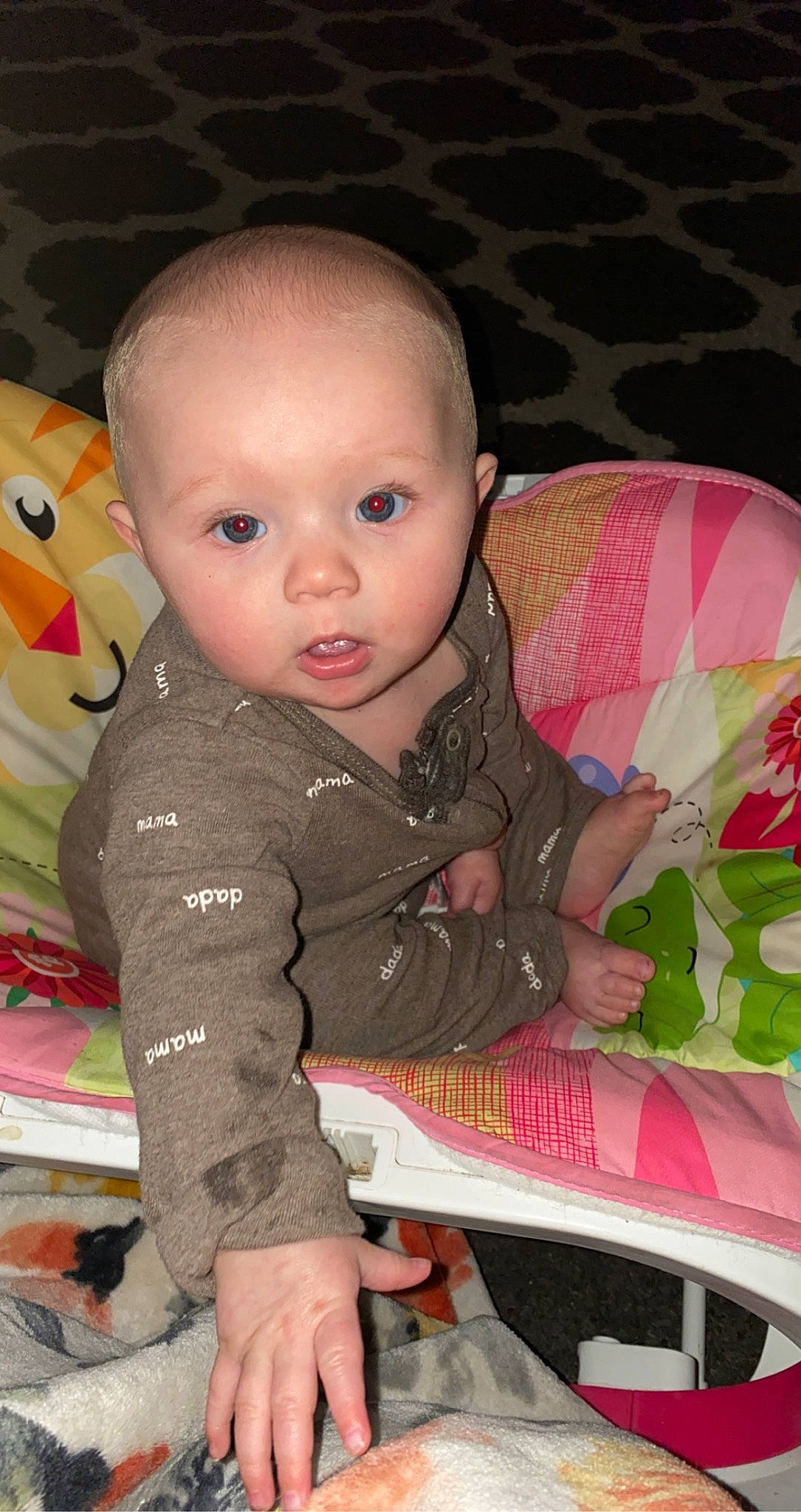 Paisley is registered to the contest to win money with this photo: baby, baby_toddler_clothing, carmine, cheek, child, chin, facial_expression, flooring, fun, iris, lip, mouth, nose, pattern, person, pink, product, sitting, skin, sleeve