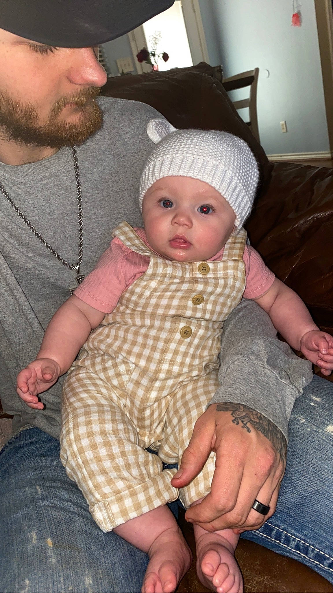 Paisley joined the competition — help win amazing prizes! baby, baby_toddler_clothing, beard, cap, cheek, child, clothing, comfort, cool, face, facial_expression, hat, headwear, human, lap, mammal, organ, people, person, skin