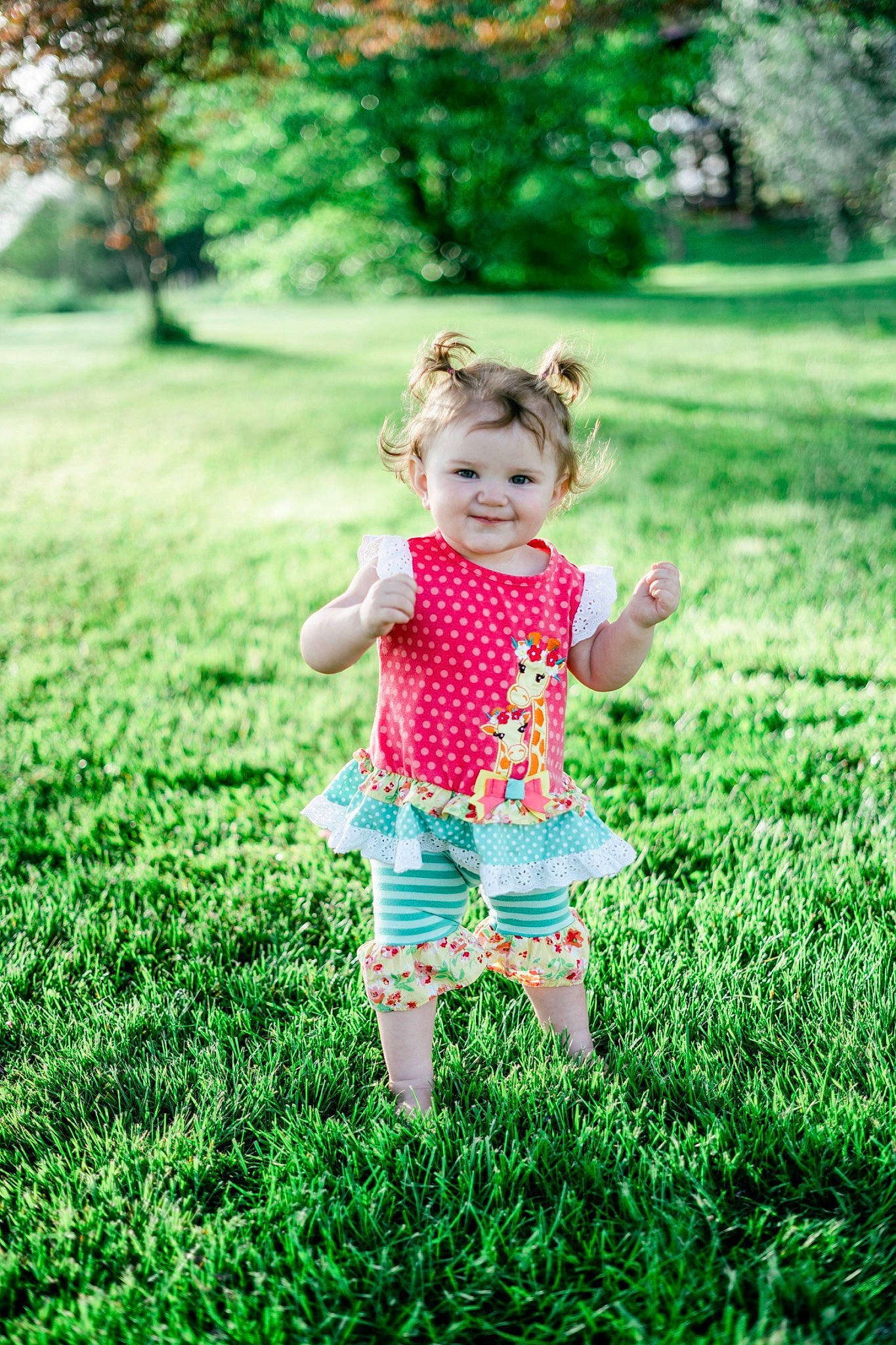 Gracelyn is registered to the contest to win money with this photo: baby, baby_toddler_clothing, child, gesture, grass, grassland, green, groundcover, happy, joy, leaf, meadow, natural_environment, natural_landscape, people_in_nature, person, plant, summer, sunlight, tints_and_shades